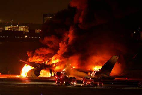 japan airline flight catches fire