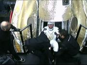 Astronauts return to earth