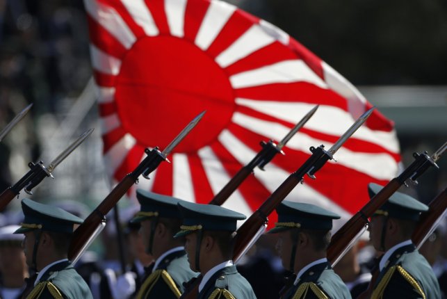 Japan public divided as laws easing limits on military take effect