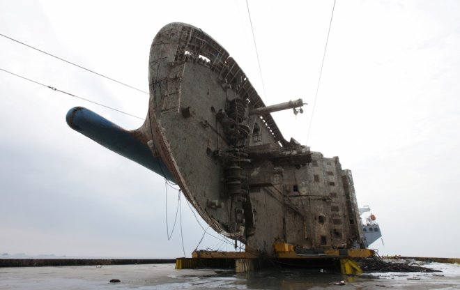 The sunken ferry Sewol sits on a semi-submersible ship during its salvage operations at the sea off Jindo, South Korea, in this handout picture provided by the Ministry of Oceans and Fisheries The sunken ferry Sewol sits on a semi-submersible ship during its salvage operations at the sea off Jindo, South Korea, in this handout picture provided by the Ministry of Oceans and Fisheries