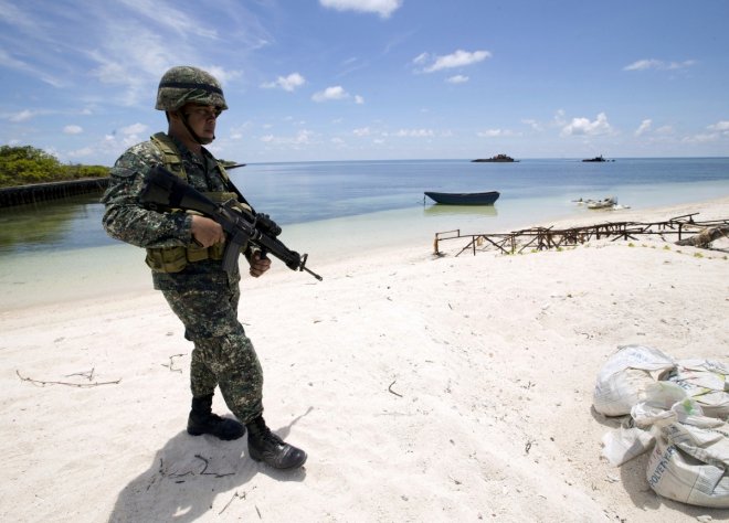 Philippines' President Duterte cancels visit to disputed South China Sea island after China's warning Philippines' President Duterte cancels visit to disputed South China Sea island after China's warning