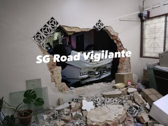Singapore-registered Audi Crashes into 4 Johor Bahru Houses Amid Heavy Rain; Driver Taken to Hospital