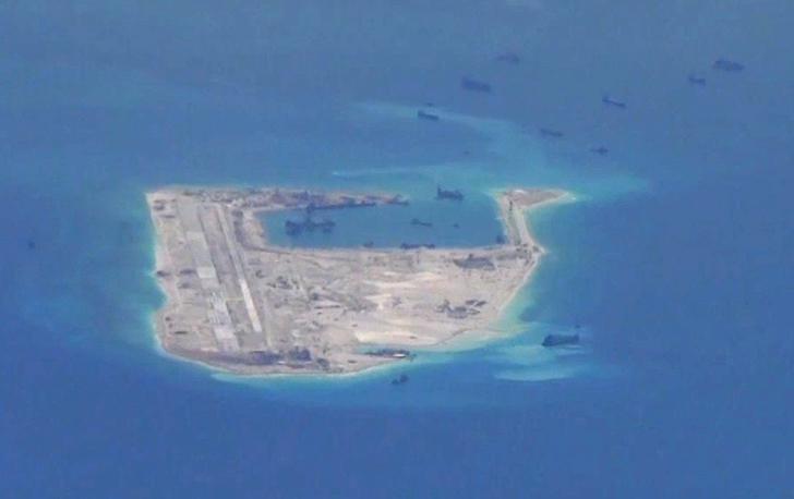 China installs rocket launchers on disputed South China Sea island