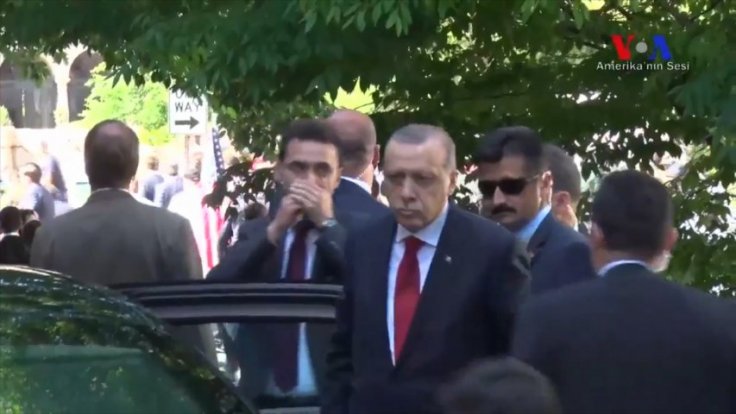 Turkish security clashes with protesters in Washington as Erdogan looks on