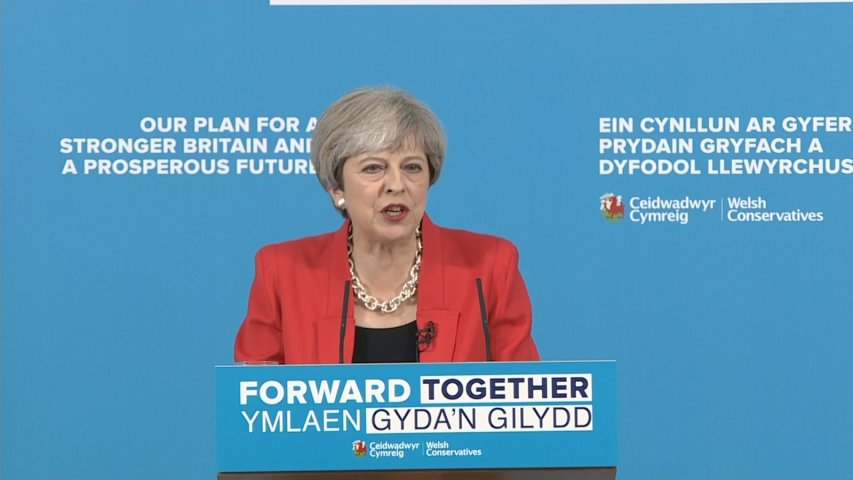 Theresa May attacks Jeremy Corbyn over social care