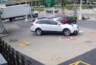 Woman foils would-be carjacker by leaping on car hood Woman foils would-be carjacker by leaping on car hood