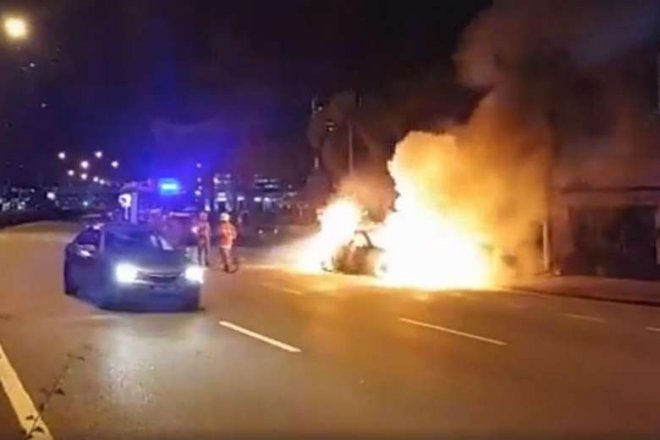 Singapore-registered BMW crashes into motorcycle in Johor; both burst into flames