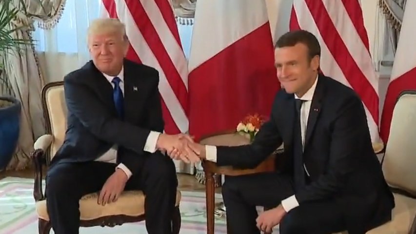 Macron-Trump handshake under scrutiny as pair meet for first time