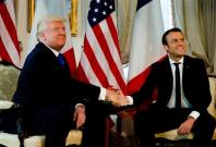 Donald Trump finally meets his hand shake match In Emmanuel Macron
