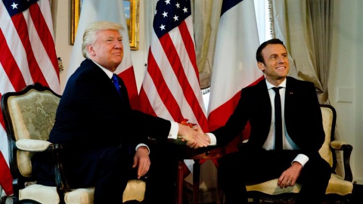 Donald Trump finally meets his hand shake match In Emmanuel Macron