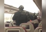 Armed police storm Malaysia Airlines plane after bomb threat