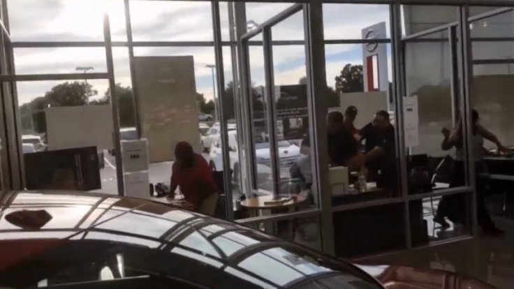 Deadly shootout captured on camera in car dealership Deadly shootout captured on camera in car dealership