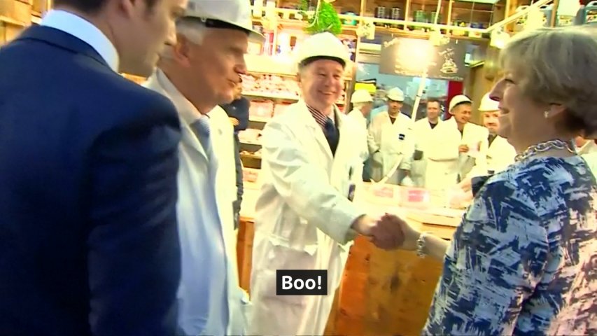 Theresa May booed by butchers in London market