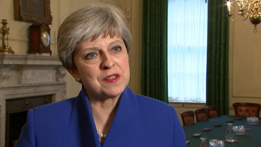 May says sorry to MPs who lost seats after election debacle