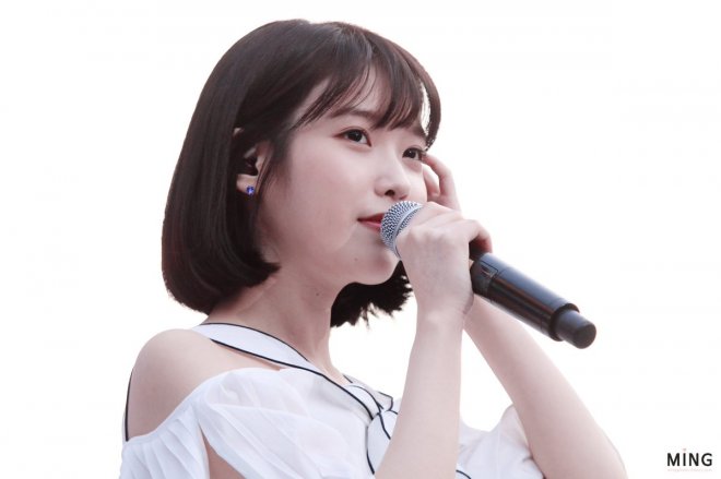 Fans are awed by IU's charm