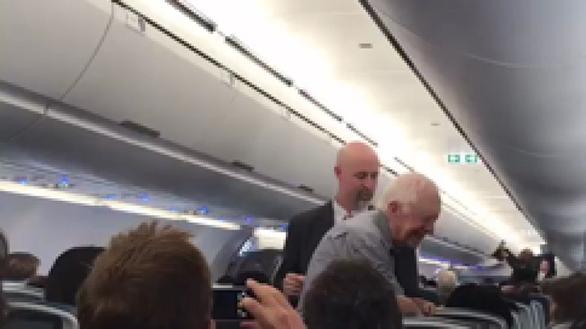 Jimmy Carter shakes the hand of everyone on his flight