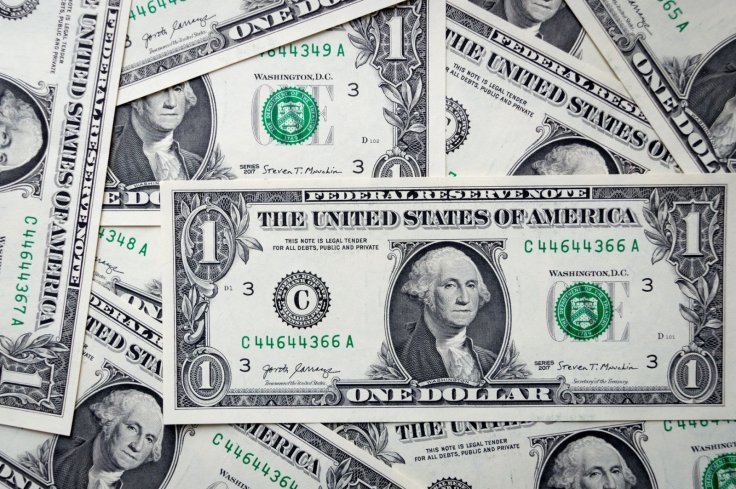 U.S. dollar notes representing rising Treasury yields and bond market pressure