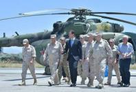 Syrian President Bashar al-Assad visits air base in western Syria