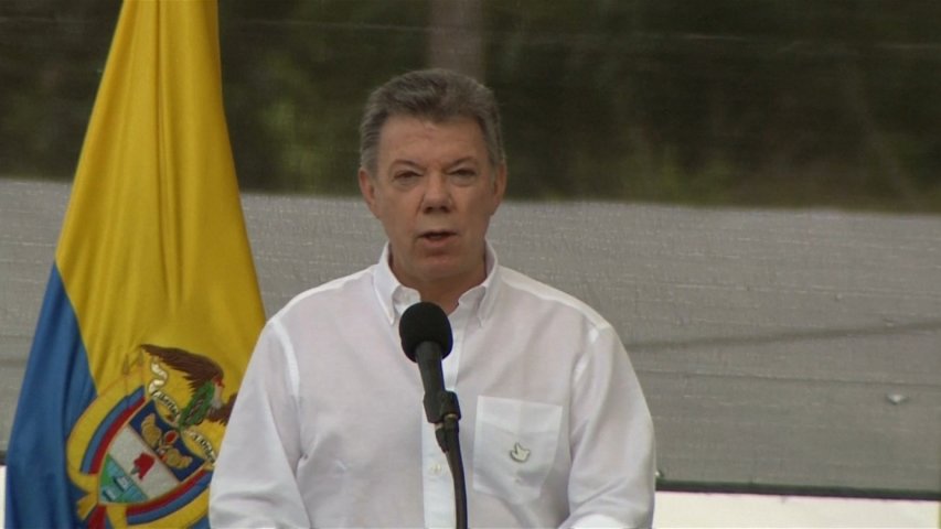 Colombias FARC celebrate end of role in war after weapons hand over